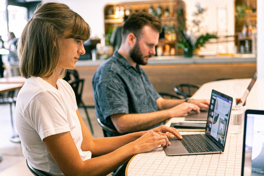 two accountants working side by side