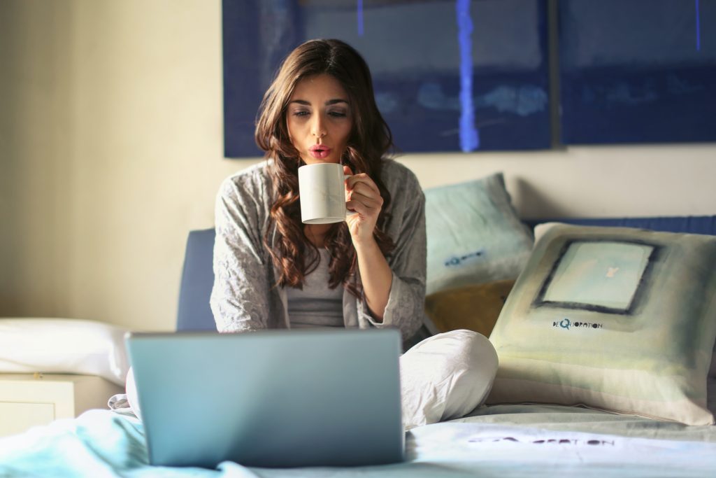 accountant working from home while drinking coffee