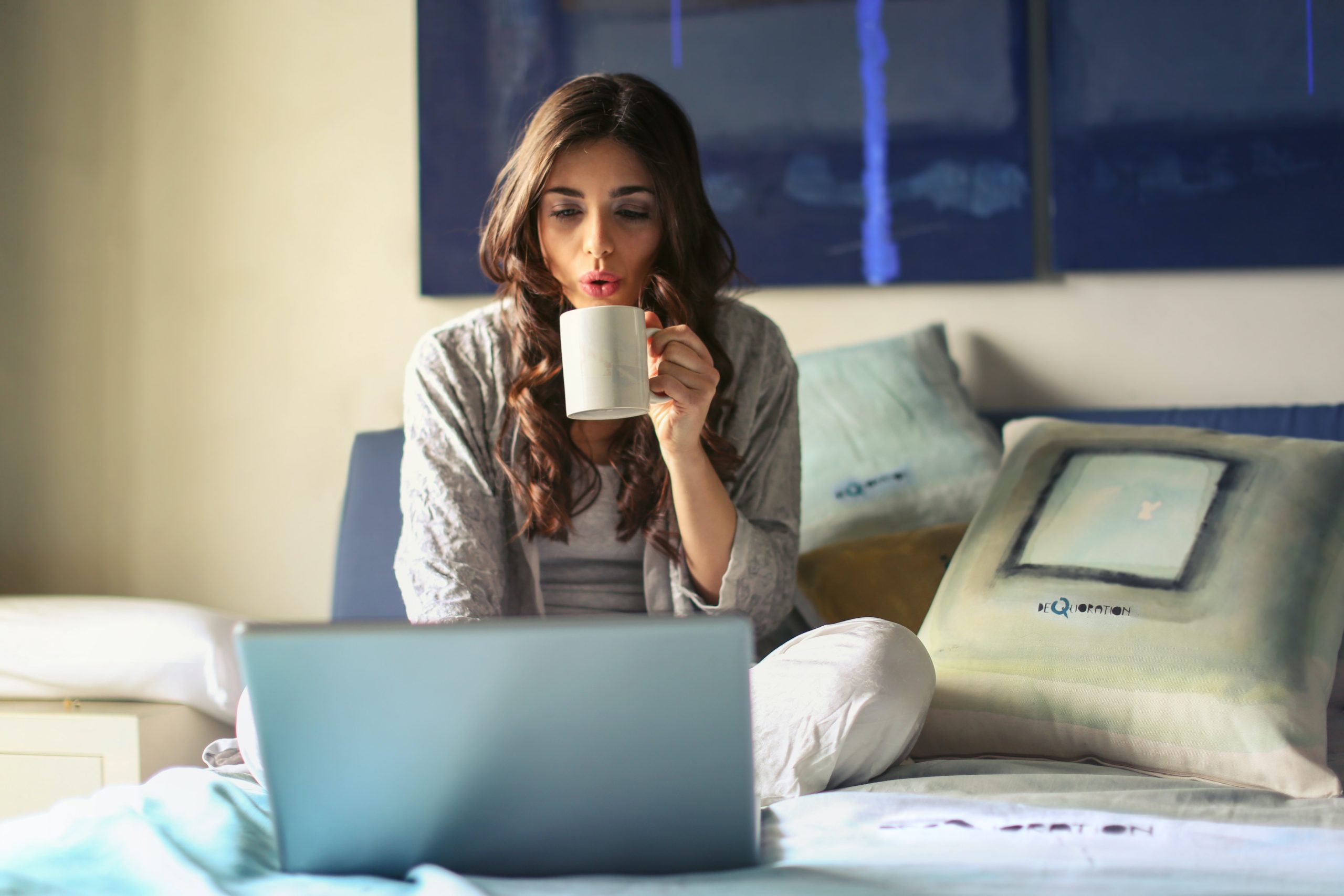 accountant working from home while drinking coffee